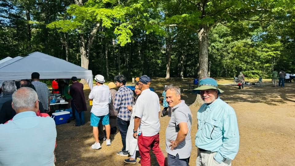 Attendees gathered around the food tent.